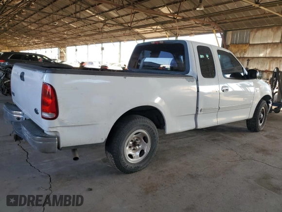 2000 Ford F-150 XL with VIN 1FTRX17W1YNB88948, listed as a Copart auction lot 83114404 with 288,100 mi miles and Salvage Title. Bid and sale history available at carsss.com. Image 3.