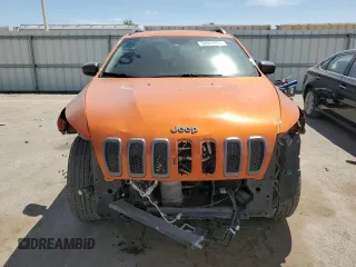2015 Jeep Cherokee Trailhawk with VIN 1C4PJMBS5FW523019, listed as a Copart auction lot 55527955 with 107,503 mi miles and Salvage title. Bid and sale history available at DreamBid. Image 5.
