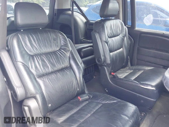 2010 Honda Odyssey Touring with VIN 5FNRL3H90AB053710, listed as a IAAI auction lot 42577646 with 255,351 mi miles and . Bid and sale history available at DreamBid. Image 8.
