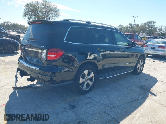 2018 Mercedes-Benz GLS 450 z VIN 4JGDF6EE6JB180836, wystawiony jako IAAI lot #41418271 z przebiegiem 129 115 mil mil oraz . Historia ofert i sprzedaży dostępna na DreamBid. Obrazek 4.