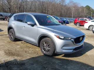 2020 Mazda CX-5 Touring with VIN JM3KFACM8L0727393, listed as a IAAI auction lot 41492627 with 91,521 mi miles. Bid and sale history available at carsss.com. Image 1.