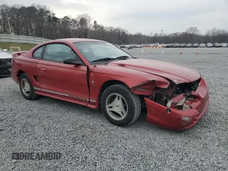 1997 Ford Mustang with VIN 1FALP4040VF152793, listed as a Copart auction lot 48961315 with 200,942 mi miles and Salvage Title. Bid and sale history available at carsss.com. Image 4.
