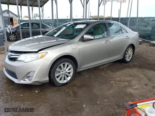 2014 Toyota Camry Hybrid LE with VIN 4T1BD1FK4EU106488, listed as a IAAI auction lot 40794286 with 98,911 mi miles. Bid and sale history available at carsss.com. Image 17.