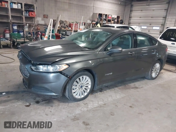 2015 Ford Fusion S Hybrid with VIN 3FA6P0UU8FR178675, listed as a IAAI auction lot 42104712 with 129,998 mi miles. Bid and sale history available at carsss.com. Image 17.