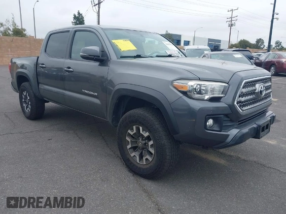 2017 Toyota Tacoma SR5 z VIN 3TMAZ5CN7HM045752, wystawiony jako IAAI lot #42057874 z przebiegiem 89 898 mil mil oraz . Historia ofert i sprzedaży dostępna na DreamBid. Obrazek 1.