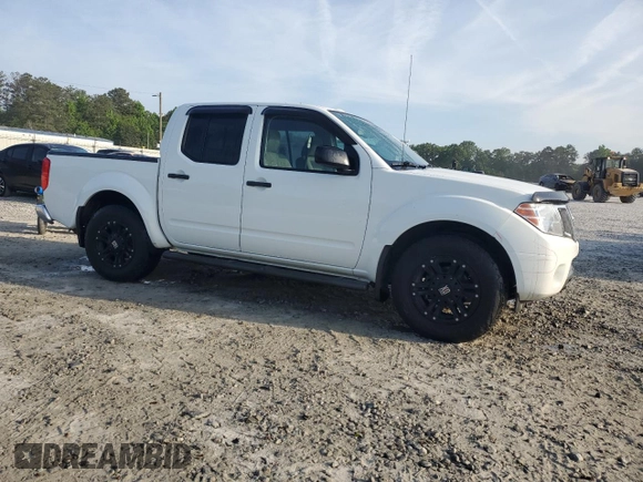2017 Nissan Frontier SV with VIN 1N6DD0ER6HN724400, listed as a Copart auction lot 54659325 with 123,800 mi miles and Salvage title. Bid and sale history available at DreamBid. Image 4.