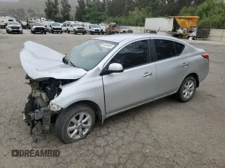 2012 Nissan Versa SL with VIN 3N1CN7AP6CL935861, listed as a Copart auction lot 60304645 with 80,397 mi miles and Salvage title. Bid and sale history available at DreamBid. Image 1.