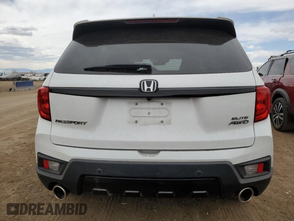 2023 Honda Passport Elite with VIN 5FNYF8H05PB013536, listed as a Copart auction lot 50671155 with 33,815 mi miles and Salvage Title. Bid and sale history available at DreamBid. Image 6.