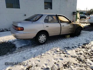 1994 Toyota Camry LE with VIN 4T1SK12E4RU448440, listed as a Copart auction lot 44557205 with 86,871 mi miles and Salvage Title. Bid and sale history available at carsss.com. Image 3.