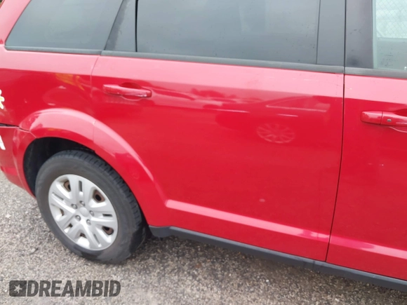 2017 Dodge Journey SE z VIN 3C4PDCAB5HT507673, wystawiony jako IAAI lot #42348007 z przebiegiem 115 918 mil mil oraz . Historia ofert i sprzedaży dostępna na DreamBid. Obrazek 17.