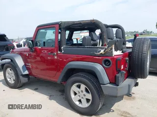 2013 Jeep Wrangler Sport z VIN 1C4GJWAG0DL543850, wystawiony jako IAAI lot #42374916 z przebiegiem 163 977 mil mil oraz . Historia ofert i sprzedaży dostępna na DreamBid. Obrazek 14.