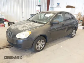 2010 Hyundai Accent GLS z VIN KMHCN4AC0AU423407, wystawiony jako IAAI lot #42428621 z przebiegiem 132 654 mil mil oraz . Historia ofert i sprzedaży dostępna na DreamBid. Obrazek 2.