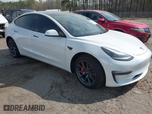2022 Tesla Model 3 with VIN 5YJ3E1EA5NF124148, listed as a IAAI auction lot 41908884 with 45,115 mi miles. Bid and sale history available at carsss.com. Image 1.