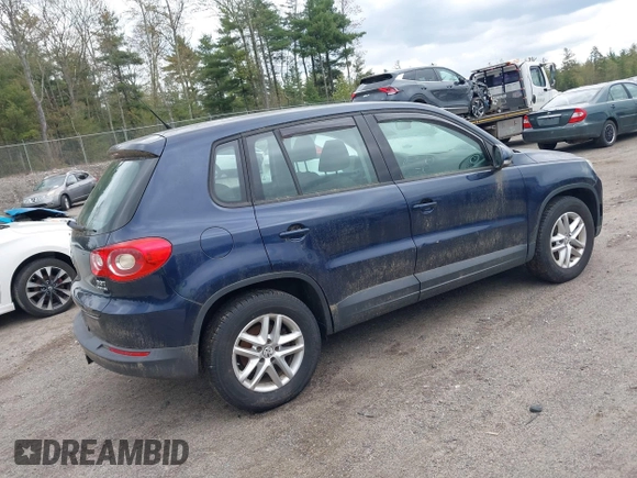 2011 Volkswagen Tiguan SE with VIN WVGBV7AX3BW511017, listed as a IAAI auction lot 42222868 with 120,955 mi miles and . Bid and sale history available at DreamBid. Image 4.