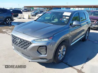 2019 Hyundai Santa Fe SE z VIN 5NMS23AD9KH037539, wystawiony jako IAAI lot #42221894 z przebiegiem 87 755 mil mil oraz . Historia ofert i sprzedaży dostępna na DreamBid. Obrazek 19.