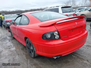 2004 Pontiac GTO with VIN 6G2VX12G34L221749, listed as a IAAI auction lot 41679612 with 1 mi miles. Bid and sale history available at carsss.com. Image 3.