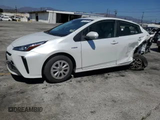 2022 Toyota Prius L Eco with VIN JTDKAMFU4N3189569, listed as a Copart auction lot 60915935 with 195,920 mi miles and Clean title. Bid and sale history available at DreamBid. Image 1.
