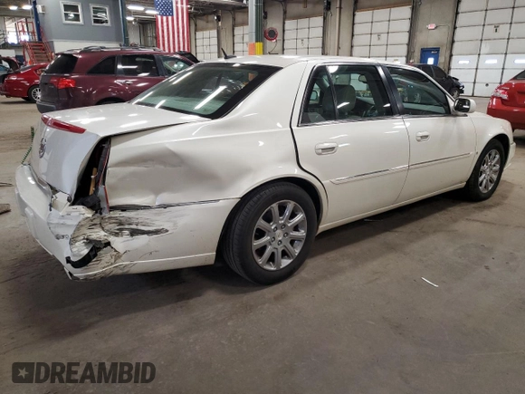 2008 Cadillac DTS 1SA z VIN 1G6KD57Y08U136593, wystawiony jako Copart lot #49208925 z przebiegiem 145 099 mil mil oraz Szkoda całkowita • Salvage title. Historia ofert i sprzedaży dostępna na DreamBid. Obrazek 3.