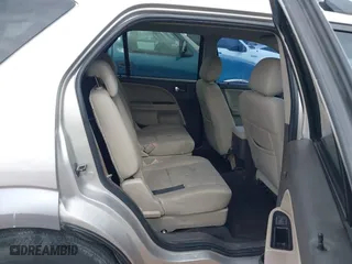 2008 Ford Taurus X SEL with VIN 1FMDK05W08GA34981, listed as a IAAI auction lot 41375371 with 233,889 mi miles. Bid and sale history available at carsss.com. Image 8.