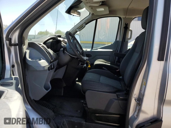 2015 Ford Transit XL with VIN 1FMZK1YMXFKB16362, listed as a Copart auction lot 57024515 with 112,665 mi miles and Salvage title. Bid and sale history available at DreamBid. Image 7.