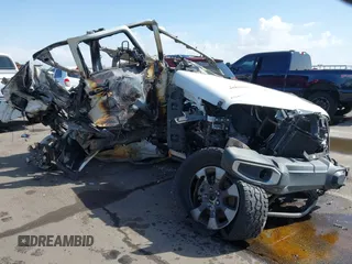 2018 Jeep Wrangler Unlimited Sahara z VIN 1C4HJXEG9JW215826, wystawiony jako IAAI lot #41935595 z przebiegiem Nie podano mil oraz . Historia ofert i sprzedaży dostępna na DreamBid. Obrazek 1.