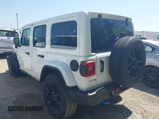 2024 Jeep Wrangler Sahara with VIN 1C4RJXP60RW292413, listed as a IAAI auction lot 42053663 with 22,808 mi miles and . Bid and sale history available at DreamBid. Image 3.
