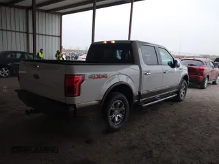 2015 Ford F-150 XLT with VIN 1FTEW1EP0FFB33802, listed as a IAAI auction lot 41527812 with 75,119 mi miles. Bid and sale history available at carsss.com. Image 4.