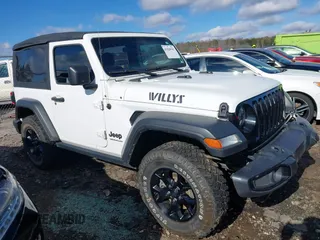 2021 Jeep Wrangler Sport S with VIN 1C4HJXAG0MW757133, listed as a IAAI auction lot 41028980 with 53,165 mi miles and . Bid and sale history available at DreamBid. Image 13.