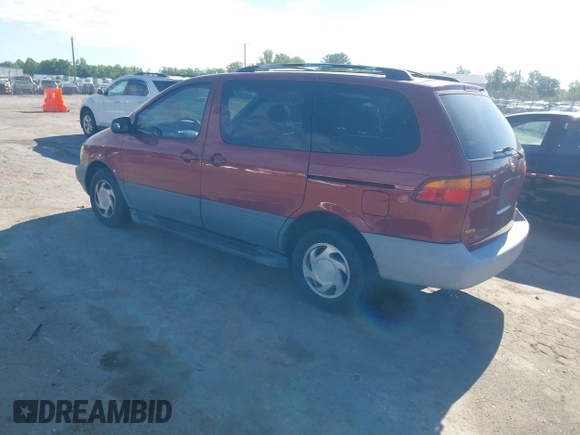 1998 Toyota Sienna LE with VIN 4T3ZF13CXWU003140, listed as a IAAI auction lot 42218556 with 230,679 mi miles and . Bid and sale history available at DreamBid. Image 3.