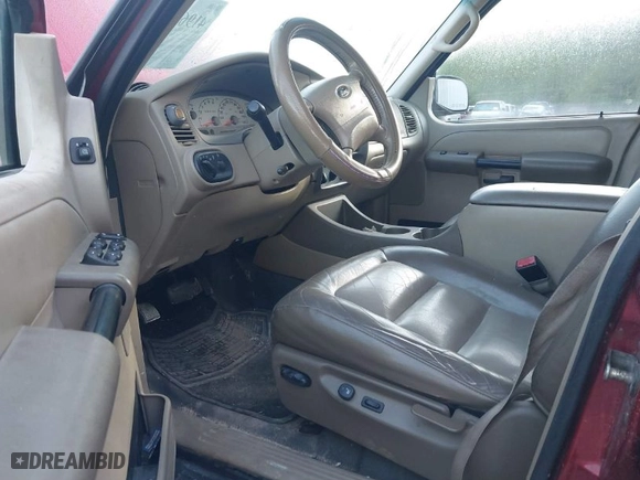 2004 Ford Explorer Sport Trac XLS with VIN 1FMZU67KX4UA61310, listed as a IAAI auction lot 41960362 with 113,889 mi miles. Bid and sale history available at carsss.com. Image 5.