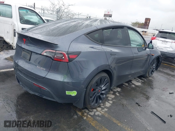 2023 Tesla Model Y Performance with VIN 7SAYGDEF0PF774282, listed as a IAAI auction lot 41807031 with Not Provided miles and . Bid and sale history available at DreamBid. Image 4.