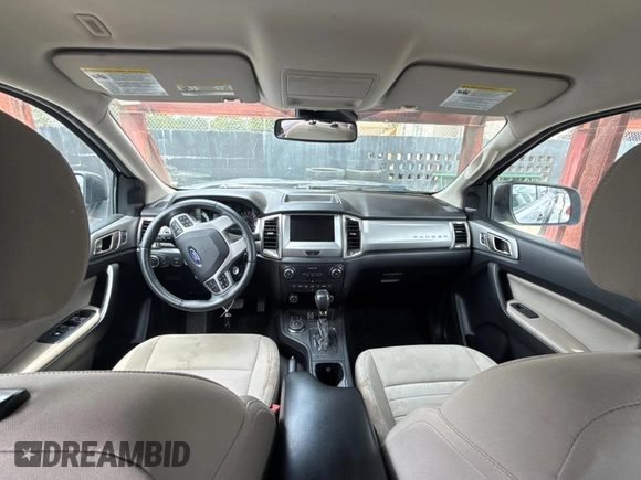 2019 Ford Ranger XL with VIN 1FTER4FH5KLA29401, listed as a Copart auction lot 64990365 with 98,143 mi miles and Salvage title. Bid and sale history available at DreamBid. Image 9.