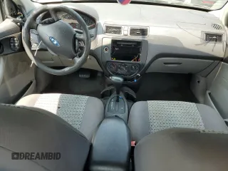 2007 Ford Focus S z VIN 1FAFP34N37W293421, wystawiony jako Copart lot #57833445 z przebiegiem 159 523 mil mil oraz Szkoda całkowita • Salvage title. Historia ofert i sprzedaży dostępna na DreamBid. Obrazek 8.