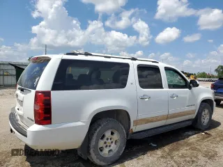 2011 Chevrolet Suburban LT with VIN 1GNSKJE35BR394032, listed as a Copart auction lot 59235184 with 248,979 mi miles and Salvage Title. Bid and sale history available at carsss.com. Image 3.