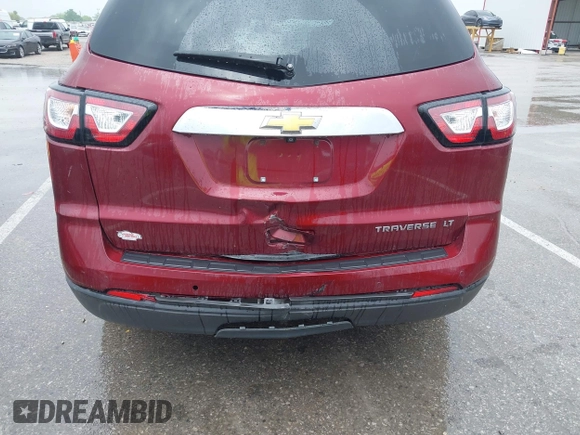 2015 Chevrolet Traverse LT z VIN 1GNKRGKD1FJ292257, wystawiony jako IAAI lot #42217359 z przebiegiem 93 892 mil mil oraz . Historia ofert i sprzedaży dostępna na DreamBid. Obrazek 6.