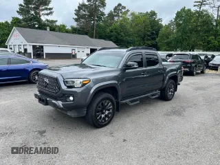 2022 Toyota Tacoma Limited with VIN 3TMGZ5AN7NM458988, listed as a Copart auction lot 65398105 with 32,115 mi miles and Salvage title. Bid and sale history available at DreamBid. Image 2.