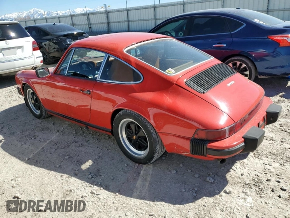 1977 Porsche 911 with VIN 9117200797, listed as a Copart auction lot 49103365 with 145,827 mi miles and Salvage title. Bid and sale history available at DreamBid. Image 2.