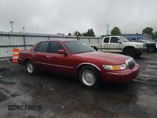 1999 Mercury Grand Marquis LS с VIN 2MEFM75W9XX701991, выставлен на аукционе Copart как лот 58388085 с пробегом 163 160 миль миль и Списание • Salvage title. История ставок и продаж доступна на DreamBid. Изображение 13.