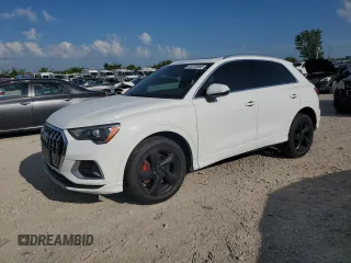 2019 Audi Q3 Premium with VIN WA1AECF34K1076675, listed as a Copart auction lot 64700065 with 65,725 mi miles and Salvage title. Bid and sale history available at DreamBid. Image 1.