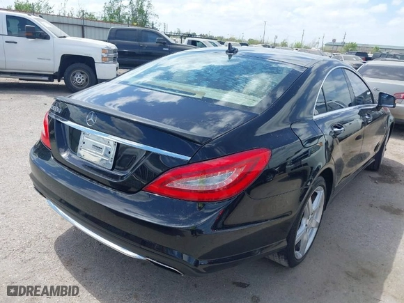 2012 Mercedes-Benz CLS-Class CLS 550 with VIN WDDLJ7DB1CA057536, listed as a IAAI auction lot 41832067 with 167,701 mi miles. Bid and sale history available at carsss.com. Image 4.