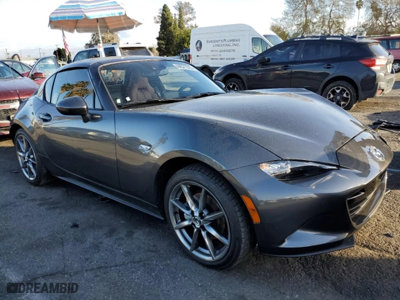 2023 Mazda MX-5 Miata RF Grand Touring with VIN JM1NDAM70P0559212, listed as a Copart auction lot 44571515 with 4,083 mi miles and Salvage Title. Bid and sale history available at carsss.com. Image 4.
