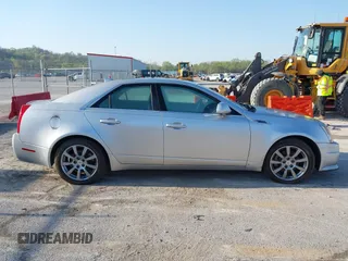2009 Cadillac CTS RWD with VIN 1G6DV57V590125951, listed as a IAAI auction lot 42005788 with 160,133 mi miles and . Bid and sale history available at carsss.com. Image 13.
