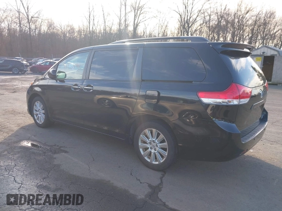 2013 Toyota Sienna XLE with VIN 5TDDK3DC0DS067993, listed as a IAAI auction lot 41832594 with 159,364 mi miles and . Bid and sale history available at DreamBid. Image 3.