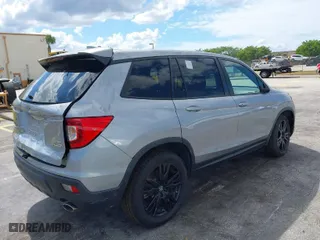 2021 Honda Passport Sport with VIN 5FNYF8H24MB004016, listed as a IAAI auction lot 41696379 with 85,373 mi miles. Bid and sale history available at carsss.com. Image 4.