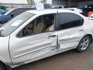 2000 Nissan Maxima GXE z VIN JN1CA31A4YT206065, wystawiony jako IAAI lot #41952514 z przebiegiem 2 953 347 mil mil oraz . Historia ofert i sprzedaży dostępna na DreamBid. Obrazek 6.