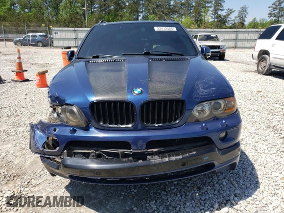 2005 BMW X5 4.8is with VIN 5UXFA93565LE83388, listed as a Copart auction lot 52412585 with 162,200 mi miles and Salvage Title. Bid and sale history available at carsss.com. Image 5.