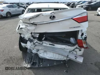 2015 Lexus ES 300h с VIN JTHBW1GG6F2080139, выставлен на аукционе Copart как лот 49512225 с пробегом 101 433 миль миль и Списание • Salvage title. История ставок и продаж доступна на DreamBid. Изображение 6.
