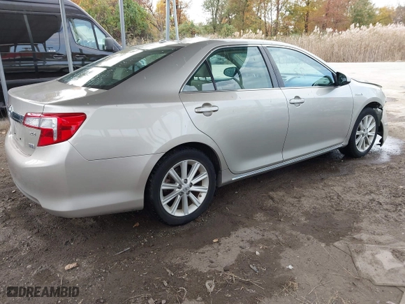 2014 Toyota Camry Hybrid LE with VIN 4T1BD1FK4EU106488, listed as a IAAI auction lot 40794286 with 98,911 mi miles. Bid and sale history available at carsss.com. Image 4.