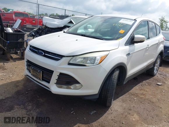 2013 Ford Escape SEL with VIN 1FMCU9HX6DUB14053, listed as a IAAI auction lot 42361297 with 144,861 mi miles and . Bid and sale history available at DreamBid. Image 17.