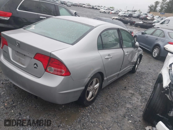 2006 Honda Civic LX with VIN 2HGFA16556H520894, listed as a IAAI auction lot 41963736 with 166,682 mi miles and . Bid and sale history available at DreamBid. Image 4.